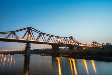 Long Bien bridge in Hanoi, Vietnam at twilight