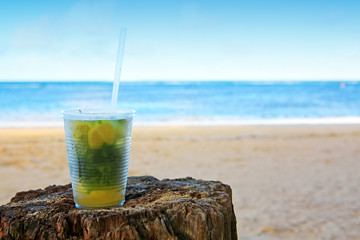 Summer drink on caribbean beach .