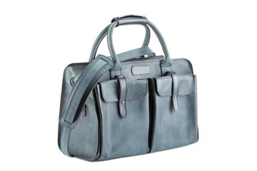 leather soft travel bag of medium size on a white background