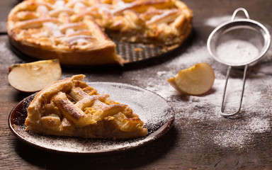 Apple  Pie on wooden table surface