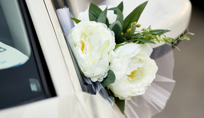 Wedding flower decoration on wedding car