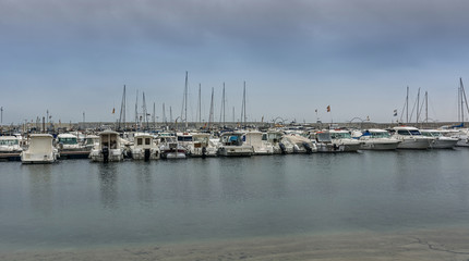 Fototapeta na wymiar Photograph of a fishing port on a cloudy day. T