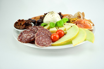 Salami with melon and spice