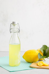 llemonade on a light background. summer traditional Italian home-made drink from Sicilian lemons. a drink of yellow color. articles made of fruits. summer background with a picture of a drink