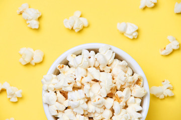 Fried corn. Fresh pop corn. Yellow blurred  background