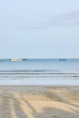 Blue sea. Clear sky. Light Sand