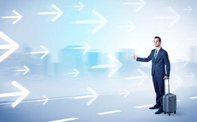Businessman hitchhiking near the city concept