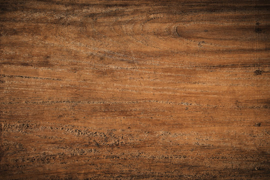 Old grunge dark textured wooden background,The surface of the old brown wood texture,top view brown teak wood panelitng