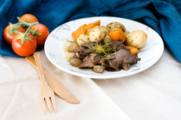 Beef meat stewed with potatoes-Traditional French cuisine Beef Bourguignon potatoes carrots in persillade