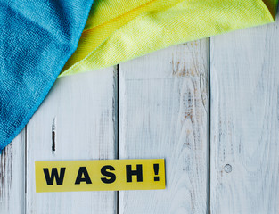 Cleanup in a kitchen. A bright abstract composition with dishwashing cloth sponges on a white...