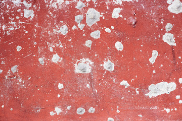 Dark red paint. Old concrete wall cover