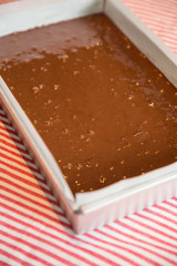 Close up Home Made brownie in cake tin.(selective Focus)
