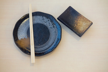 Japanese sushi chopsticks and soy sauce bowl