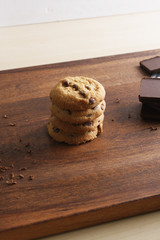 cookies with chocolate on a wooden background