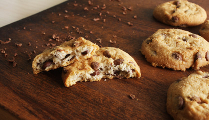 cookies with chocolate on a wooden background