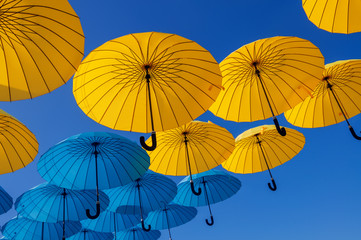 colorful umbrellas under the blue sky