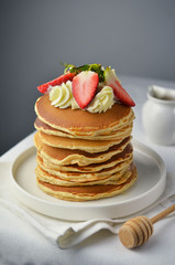Pancakes with strawberry and sauce
