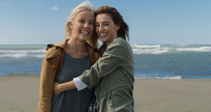 Women Smiling And Enjoying Life at Beach