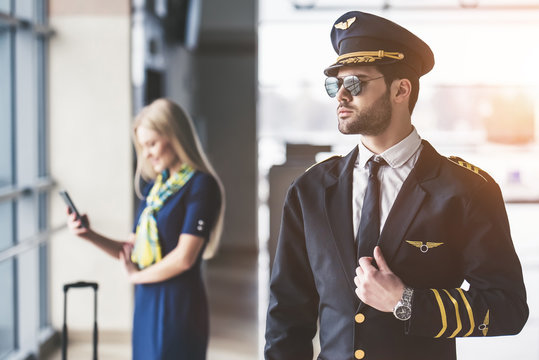 Pilot and flight attendant in airport