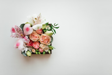 Beautiful and cute flower composition in a little box