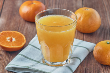 Fresh organic orange juice in a glass beaker. Healthy eating.