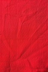 Texture of red nylon fabric - aviation tarpaulin close up