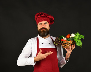 Green grocery concept. Man with beard on black background