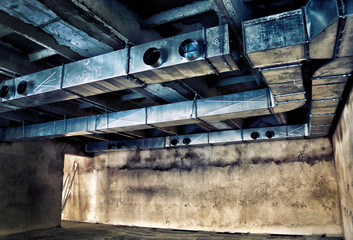 Ventilation pipes and air ducts of industrial air in the old building
