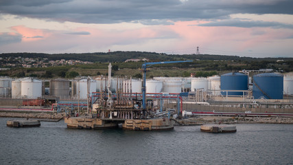Jetty of LPG LNG marine terminal in sunset