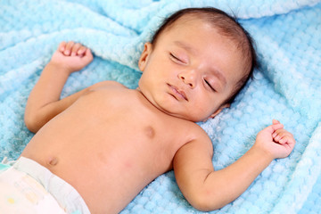 Close up of newborn baby boy sleeping