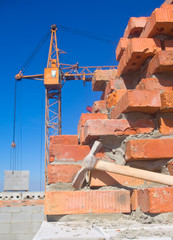 Worker's pick hammer outdoors at building area