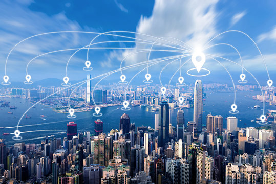 Networking connectivity graphic with Hong Kong business city skyline.