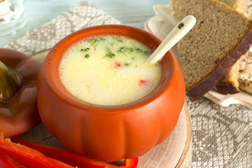 Vegetable soup with red pepper and cress salad. Vegetable soup with rye bread.Top view.