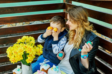 Easter holiday .Mother and son preparing for Easter.