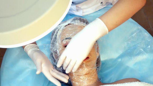 Skin Rejuvenation Treatment massage with facial cream, 4k footage.