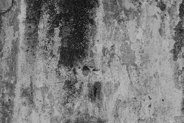 Wall fragment with scratches and cracks