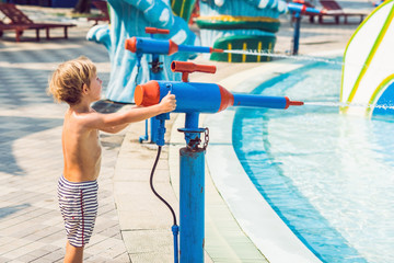 Boy is having fun in the water park