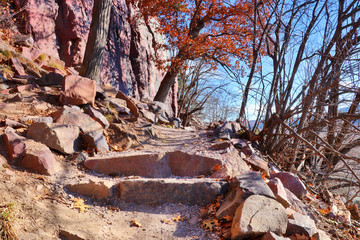 Wisconsin ice age nature background. Scenic view with rocky hiking trail at Devil’s Lake State Park, Baraboo area, Wisconsin, Midwest USA.
