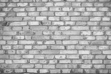 Old brick wall with cracks and scratches , background, texture