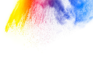Abstract multicolored dust explosion on white background. Abstract color powder splattered  on background.