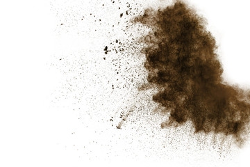 abstract brown dust explosion on  white background ,abstract brown powder splattered on white...