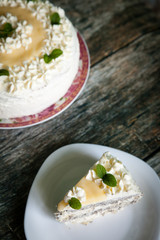 Delicious homemade poppy seed cake with lemon curd and whipped cream