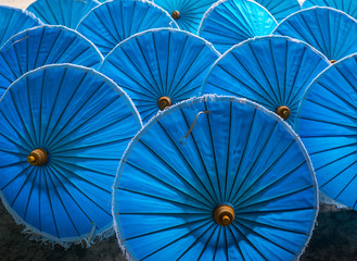 Bright blue umbrellas in the province of chiang mai in Thailand. Decorative Arts