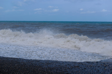 Fabulous stormy sea waves breaking near the coast