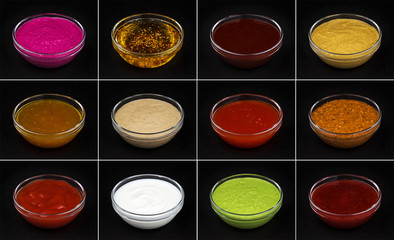 Set of different sauces isolated on black background