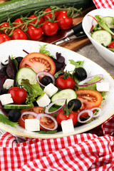 Salad with cheese and fresh vegetables and olives. Greek salad.