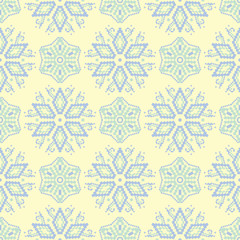 Floral seamless pattern. Beige background with light blue and green flower elements