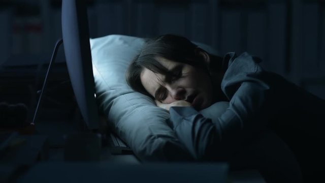 Office worker sleeping at work