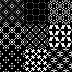 Black and white geometric ornaments. Collection of seamless patterns