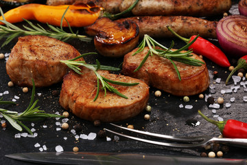 Assorted delicious grilled meat with vegetable on a barbecue
